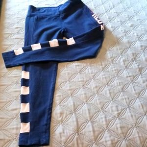 2 for $8 Girl's leggings, size 12 in navy with Boston Red Sox logo down side.